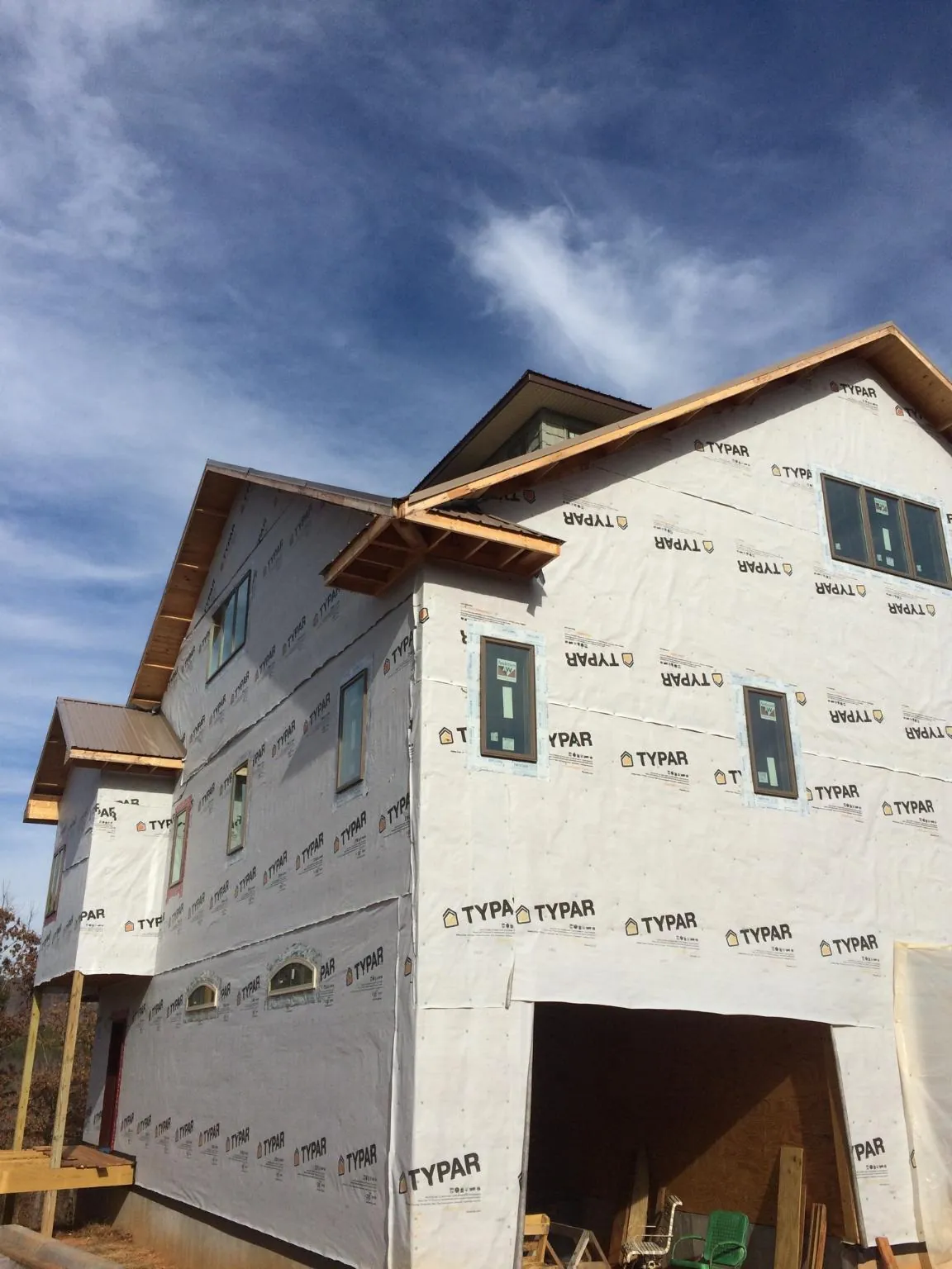 Stick built house wrapped in Typar with new roof framing and dormers in Nauvoo